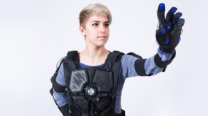 Woman in haptic suit. Haptics are a great tool for VR marketing.